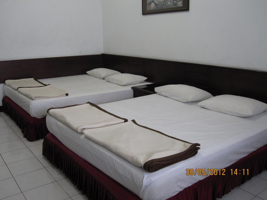 Hotel Santosa Маланг Номер фото